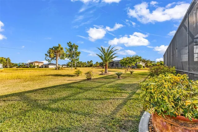 an aerial view of a residential building and lake view