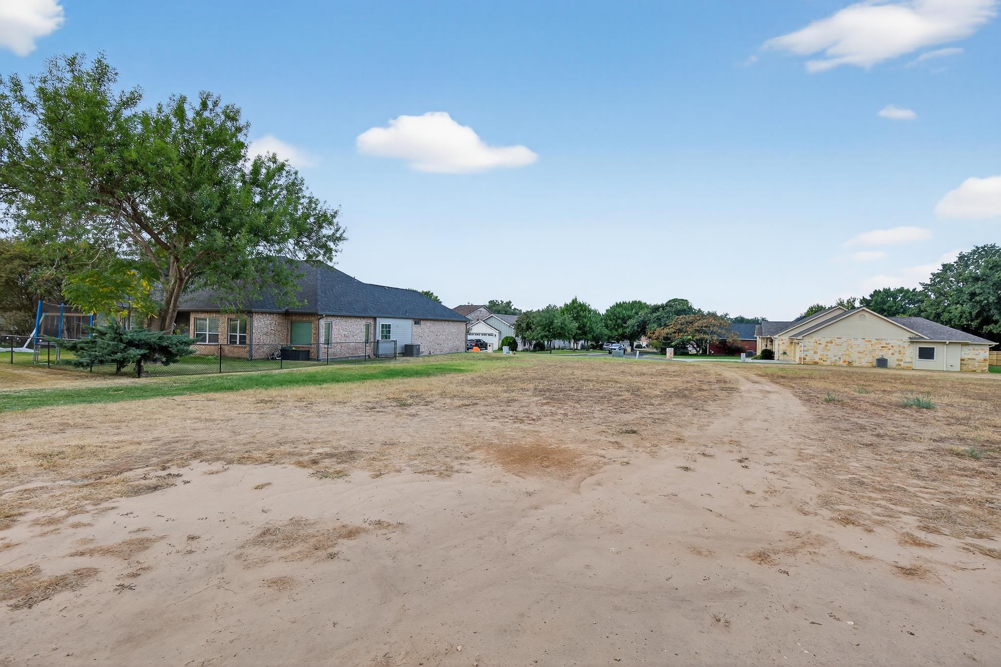 Lot 150-21b Muirfield Marble Falls, TX 78654 - Photo 4 of 8 a view of a house with a yard