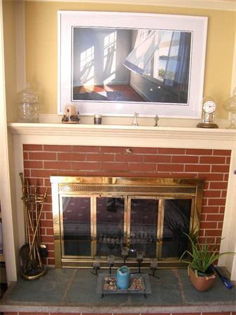 25 Jeffrey Road Wayland, MA 01778 - Photo 7 of 16 a view of a fireplace with wooden frame