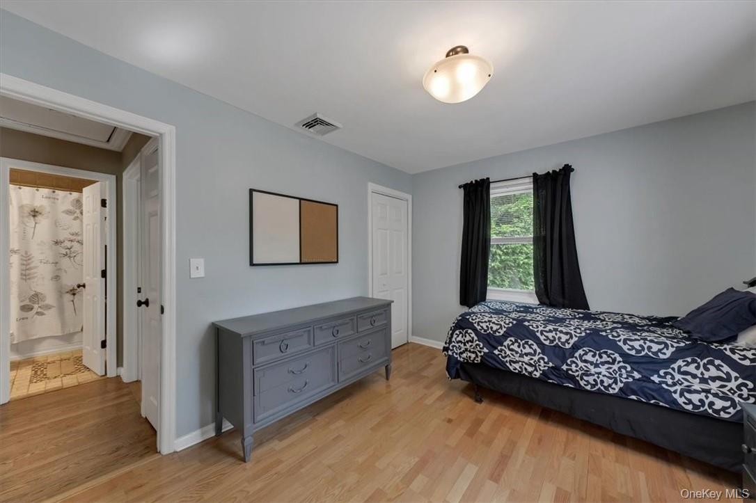 13 Split Rock Road Mahopac, NY 10541 - Photo 11 of 36 a bedroom with a bed and a window