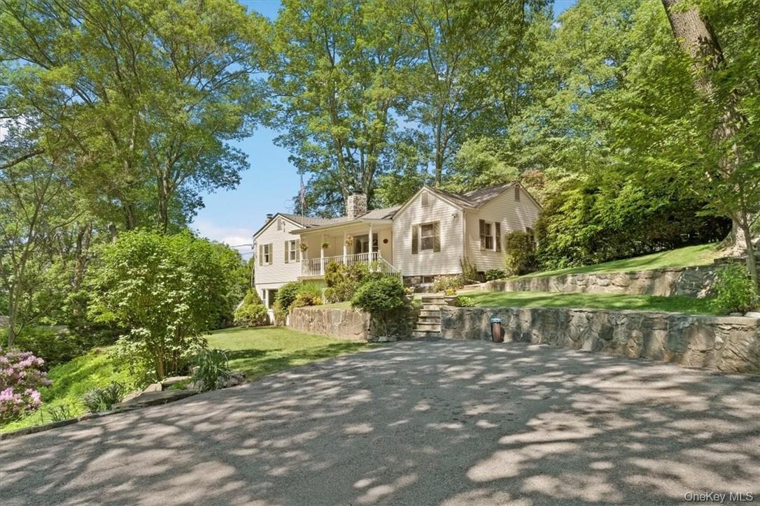 13 Split Rock Road Mahopac, NY 10541 - Photo 2 of 36 a front view of a house with a yard