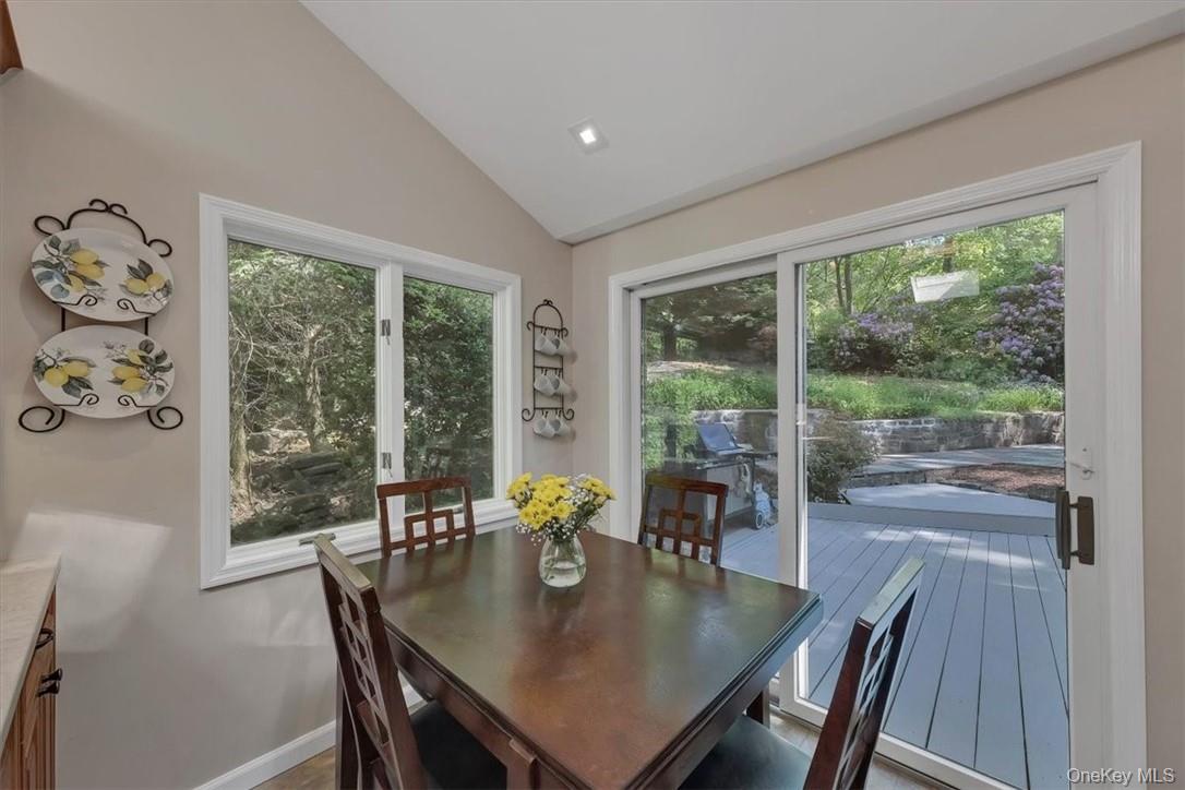 13 Split Rock Road Mahopac, NY 10541 - Photo 23 of 36 a view of a dining room with furniture window and outside view