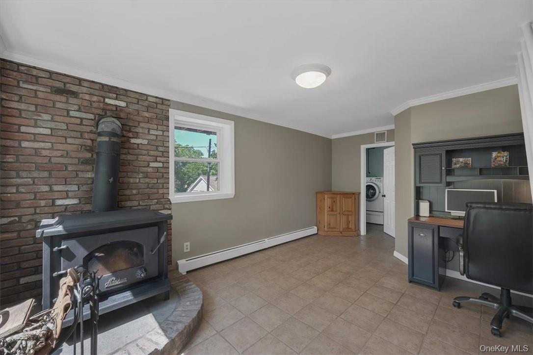 13 Split Rock Road Mahopac, NY 10541 - Photo 25 of 36 a view of a livingroom with furniture and a window
