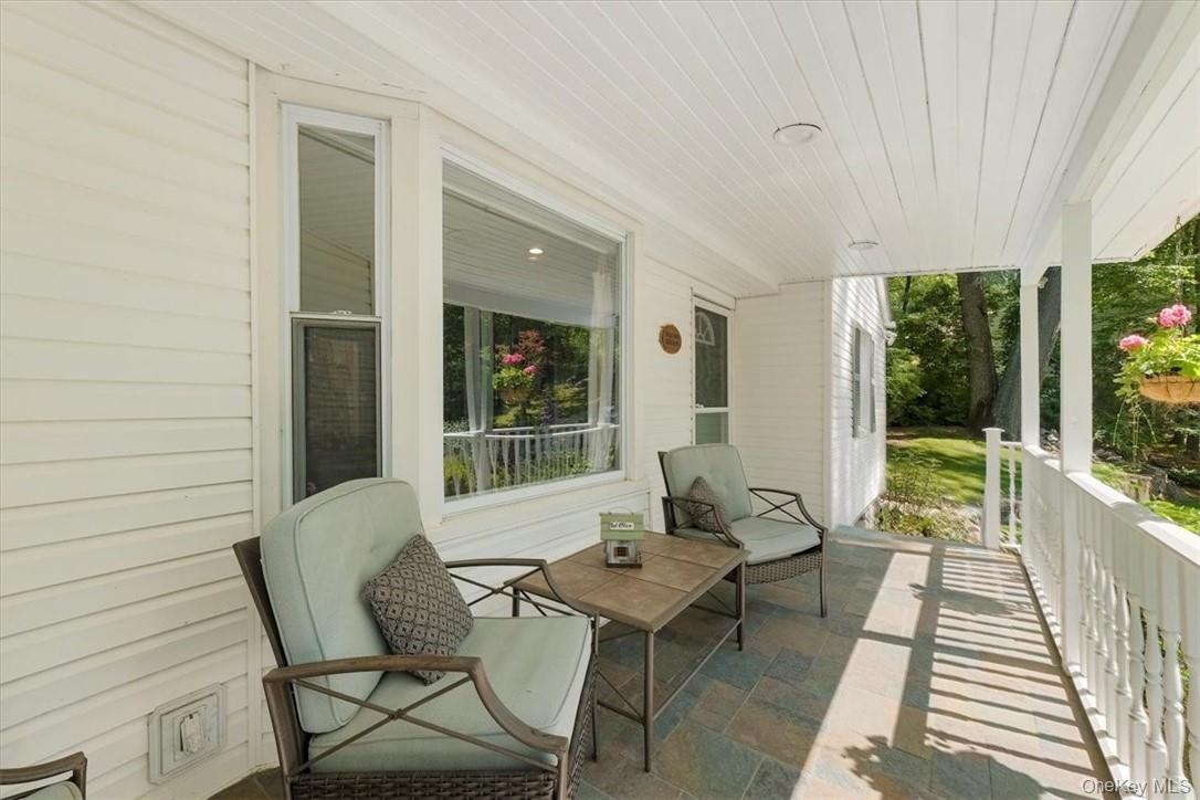 13 Split Rock Road Mahopac, NY 10541 - Photo 3 of 36 a view of a patio with furniture