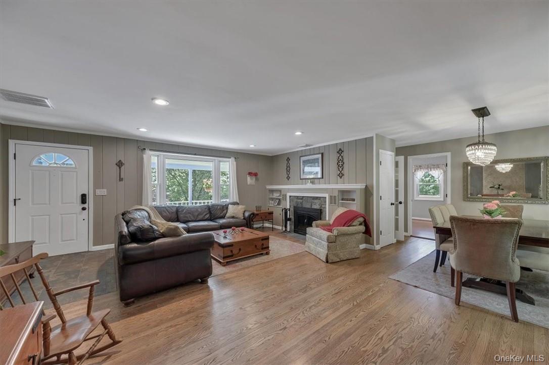 13 Split Rock Road Mahopac, NY 10541 - Photo 6 of 36 a living room with furniture and wooden floor