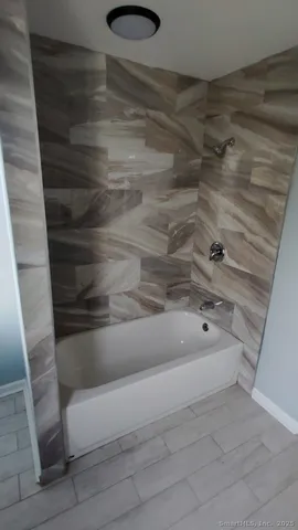 a bathroom with a bathtub