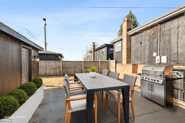 a spacious bathroom with a sink and mirror
