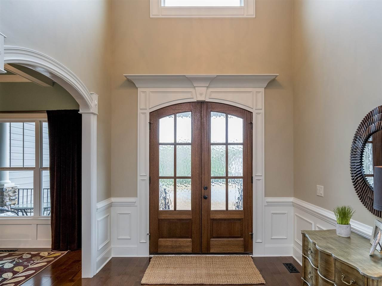 3316 Bryant Falls Court Raleigh, NC 27613 - Photo 2 of 30 Two-story with arched picture window, oil rubbed bronze chandelier and wainscoting Foyer