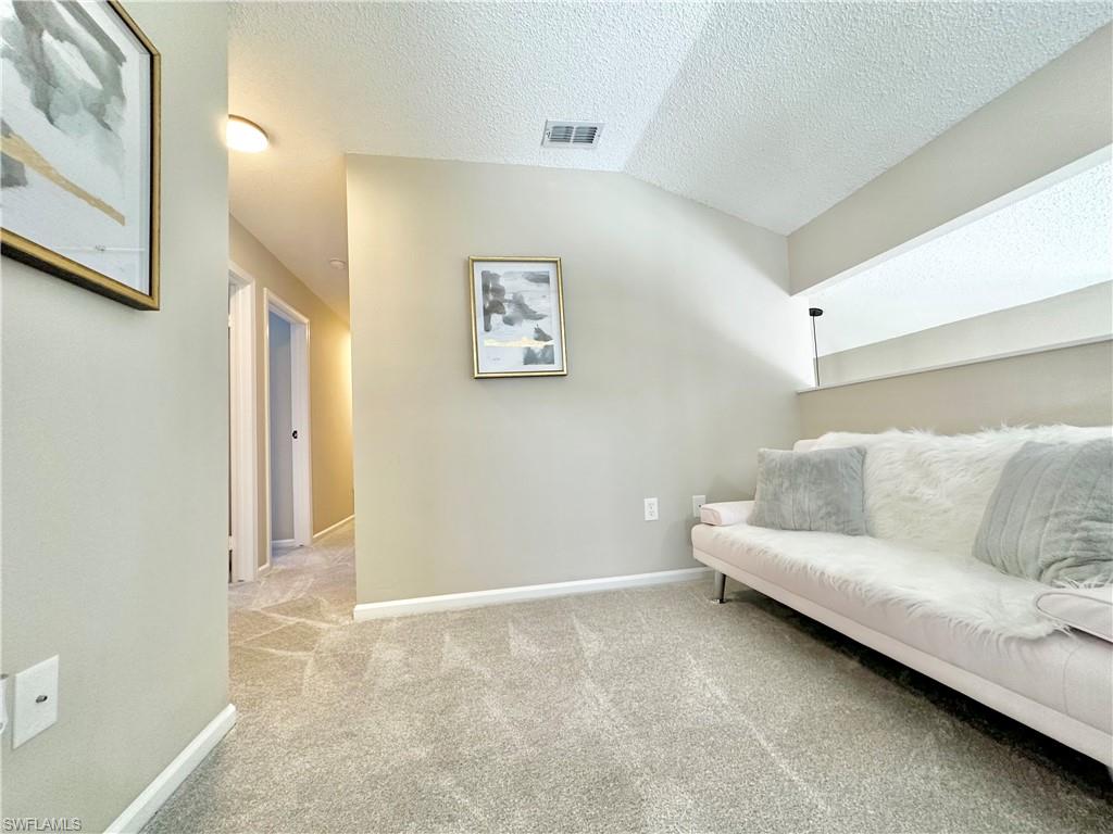 3639 Kent Drive Naples, FL 34112 - Photo 34 of 40 a living room with a couch