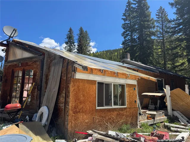 a backyard of a house with seating space