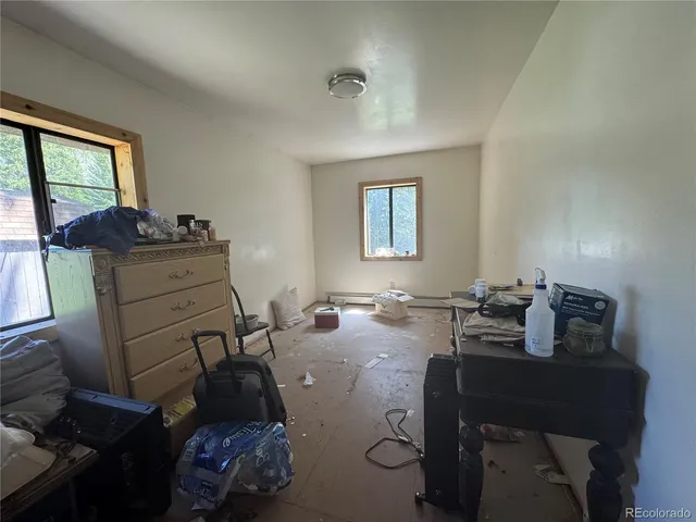 a workspace with furniture and window