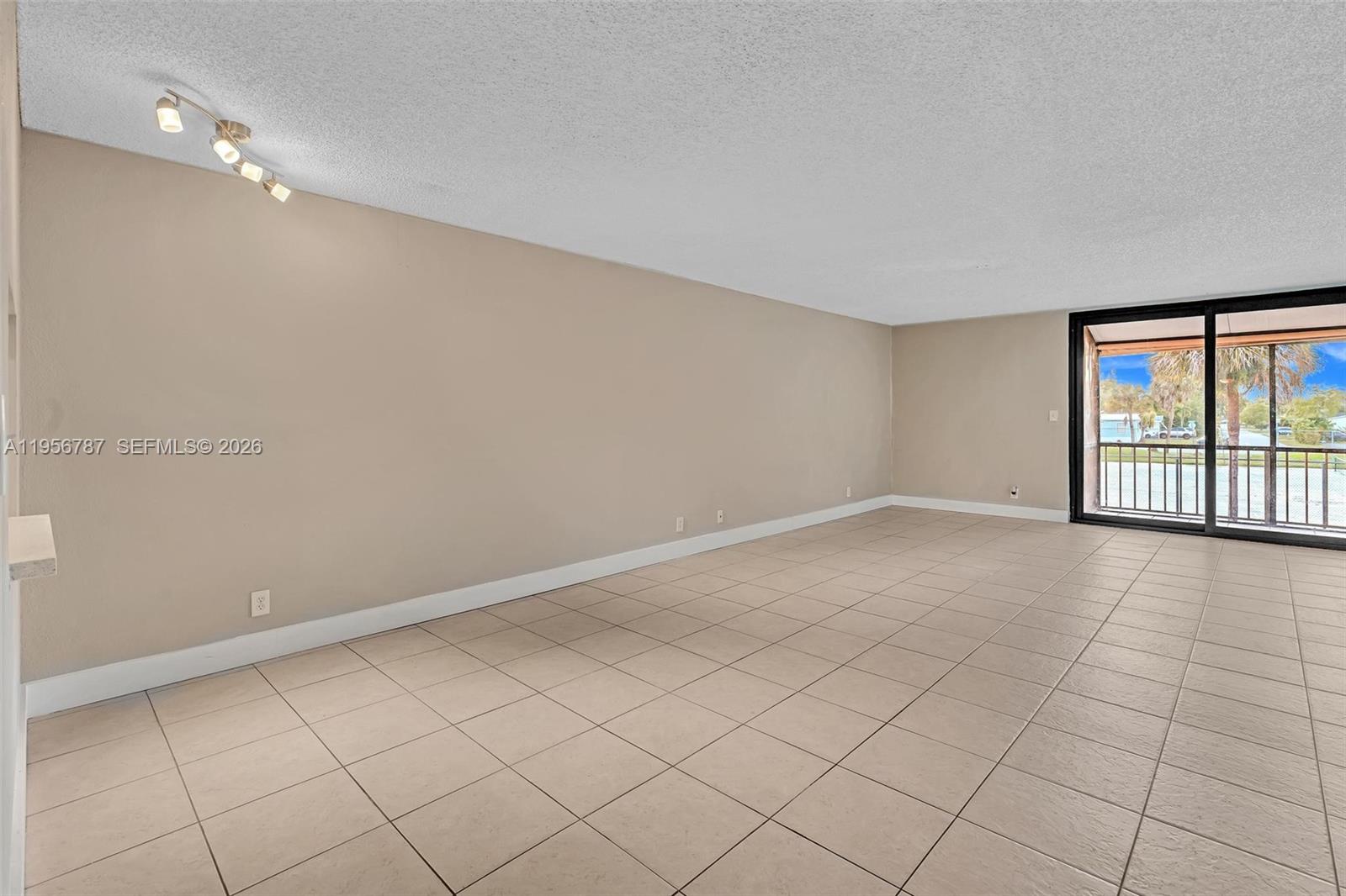 400 Commodore Drive, Unit 215 Plantation, FL 33325 - Photo 11 of 30 a view of an empty room with a window