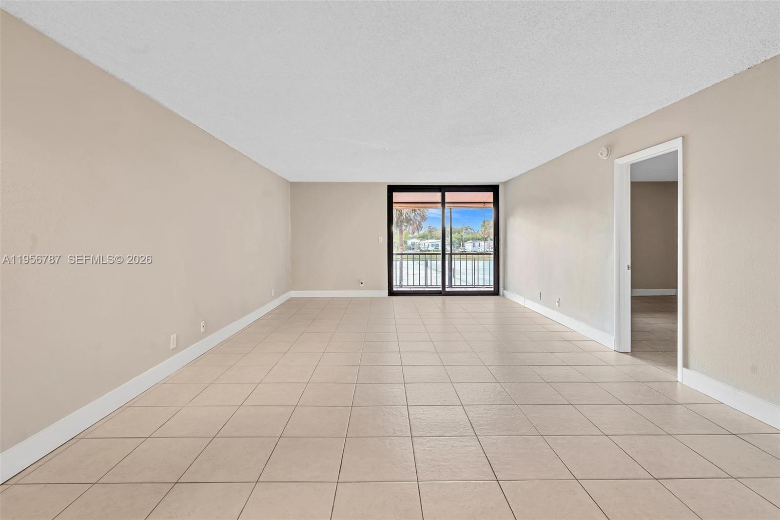 400 Commodore Drive, Unit 215 Plantation, FL 33325 - Photo 12 of 30 a view of an empty room with a window