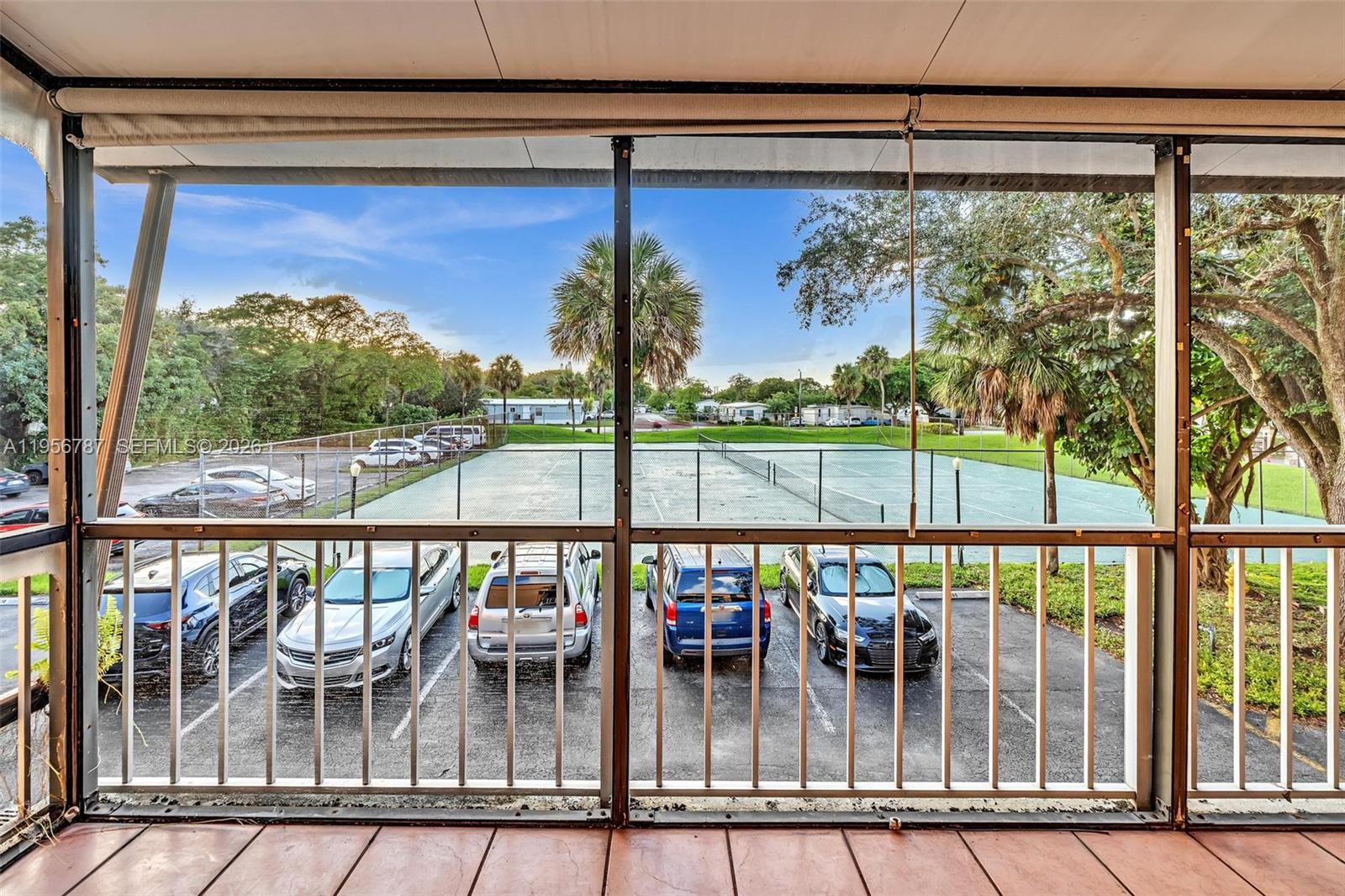 400 Commodore Drive, Unit 215 Plantation, FL 33325 - Photo 18 of 30 a view of a balcony with chairs