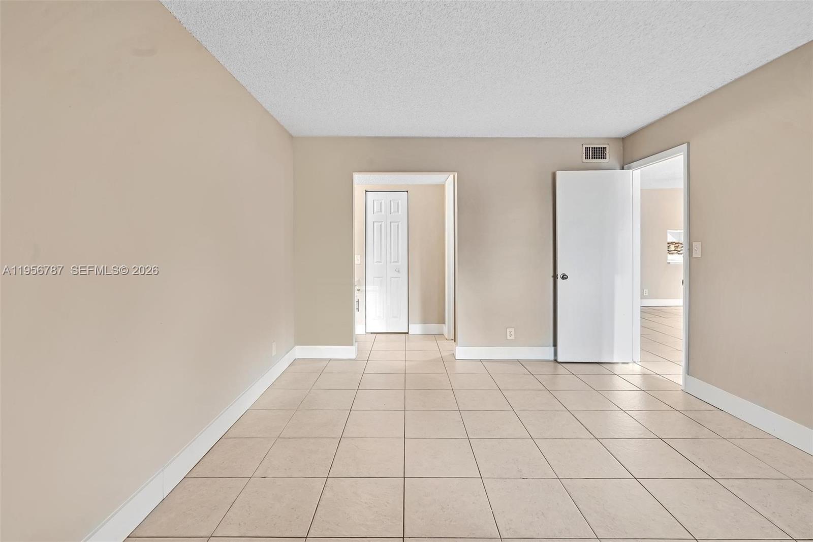 400 Commodore Drive, Unit 215 Plantation, FL 33325 - Photo 23 of 30 a view of an empty room with window
