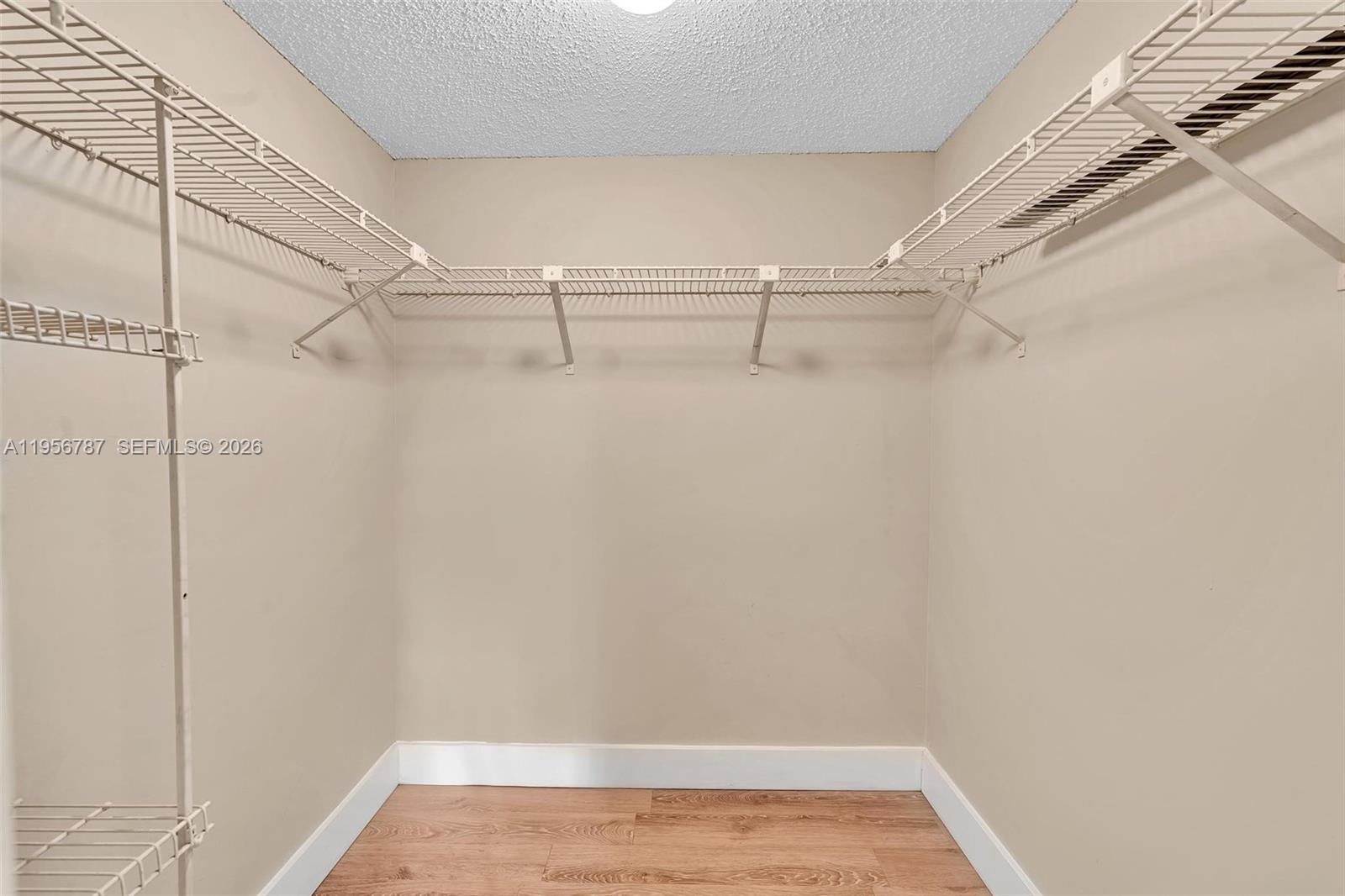 400 Commodore Drive, Unit 215 Plantation, FL 33325 - Photo 26 of 30 a view of a room with racks on the wall