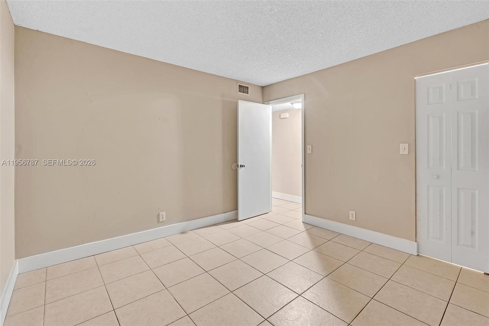 400 Commodore Drive, Unit 215 Plantation, FL 33325 - Photo 28 of 30 a view of an empty room