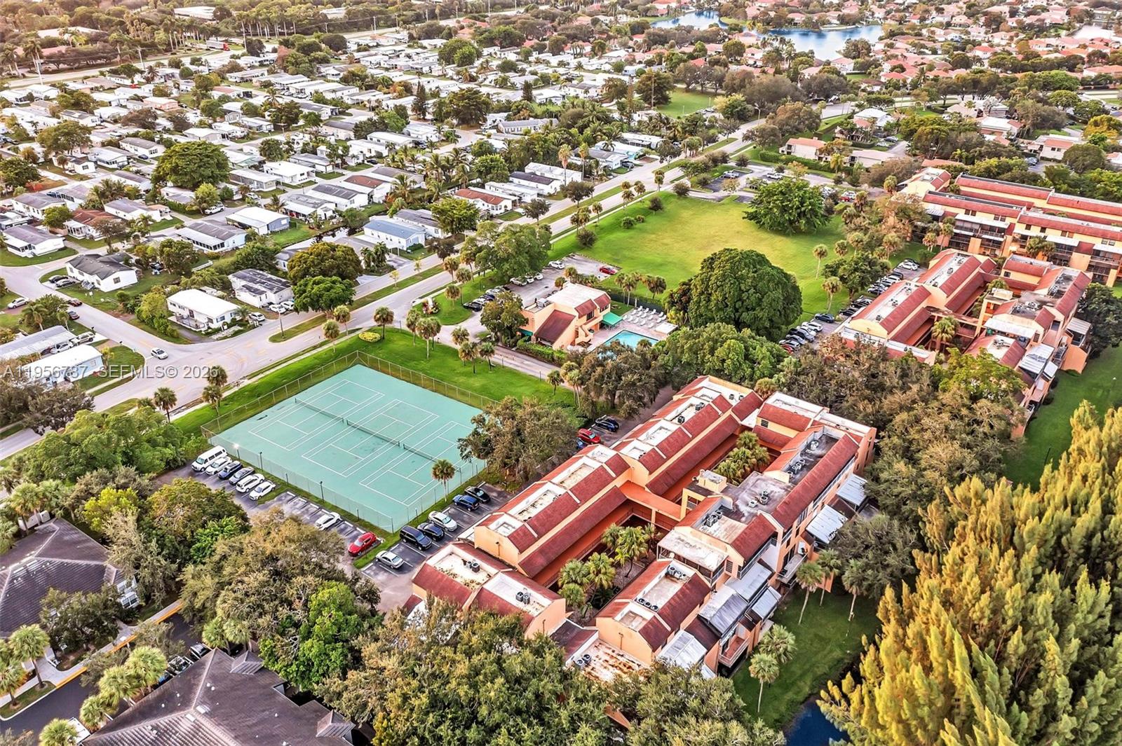 400 Commodore Drive, Unit 215 Plantation, FL 33325 - Photo 4 of 30 an aerial view of a residential houses with yard