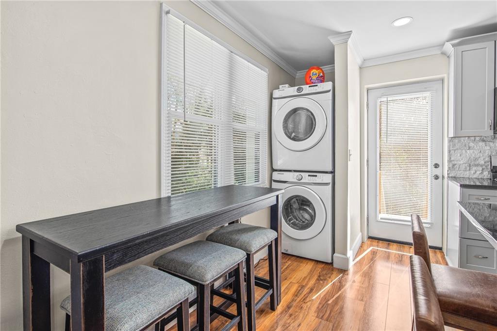 1298 Douglas Street Southwest, Unit A Atlanta, GA 30314 - Photo 9 of 11 a view of a hallway with washer and dryer
