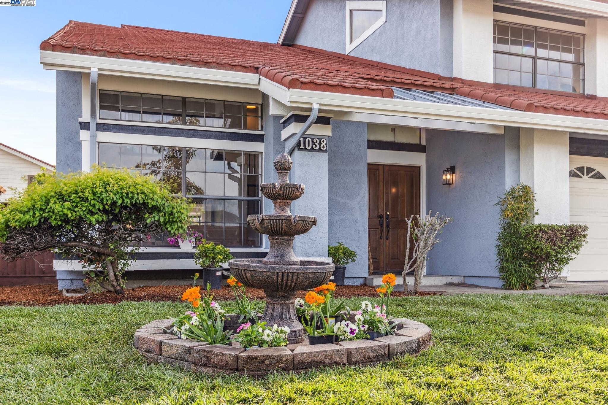 1038 Otis Drive Alameda, CA 94501 - Photo 1 of 1 a front view of a house with garden