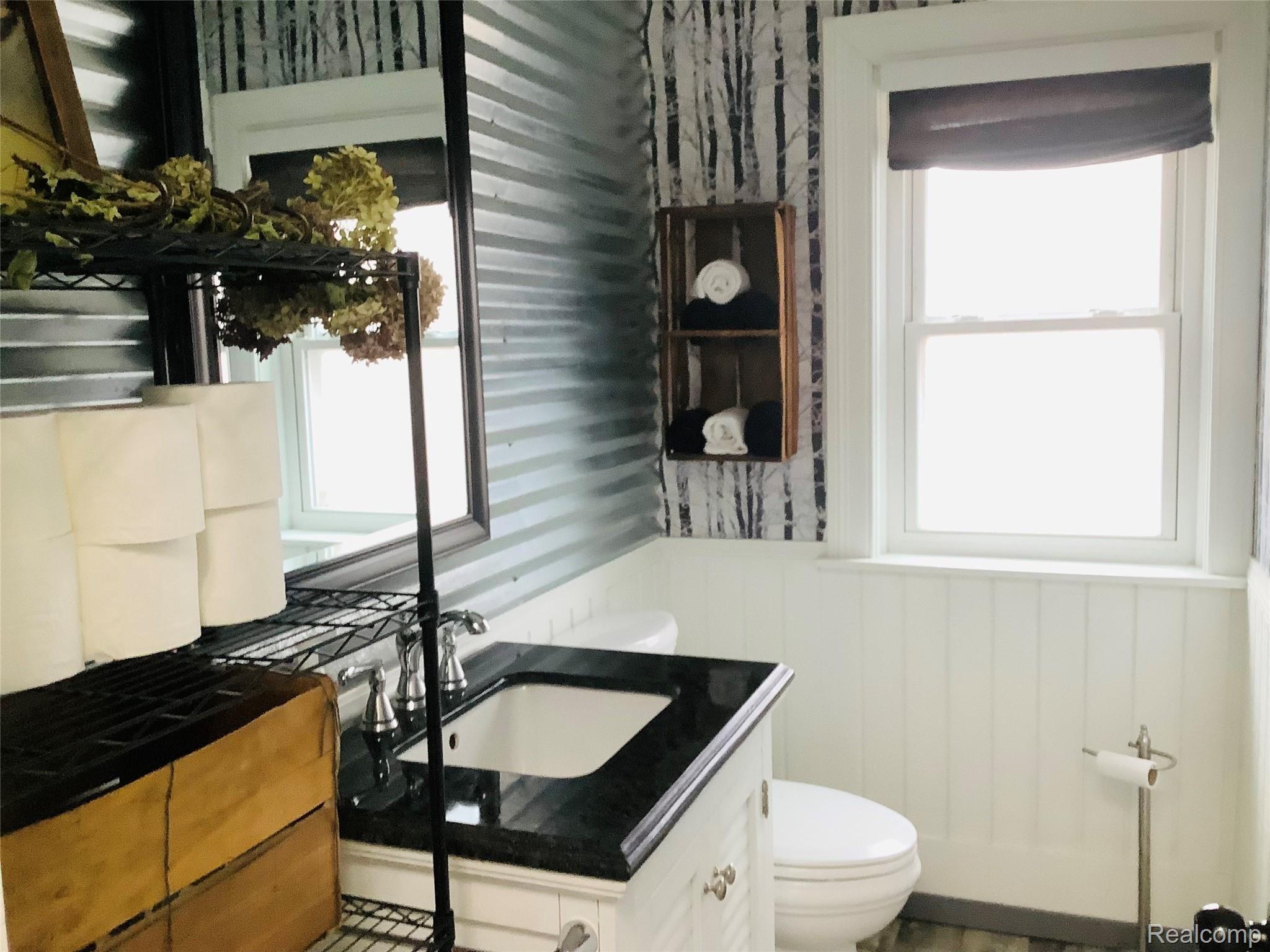 14300 Sullivan Road Capac, MI 48014 - Photo 32 of 65 Half bathroom off kitchen 8x4