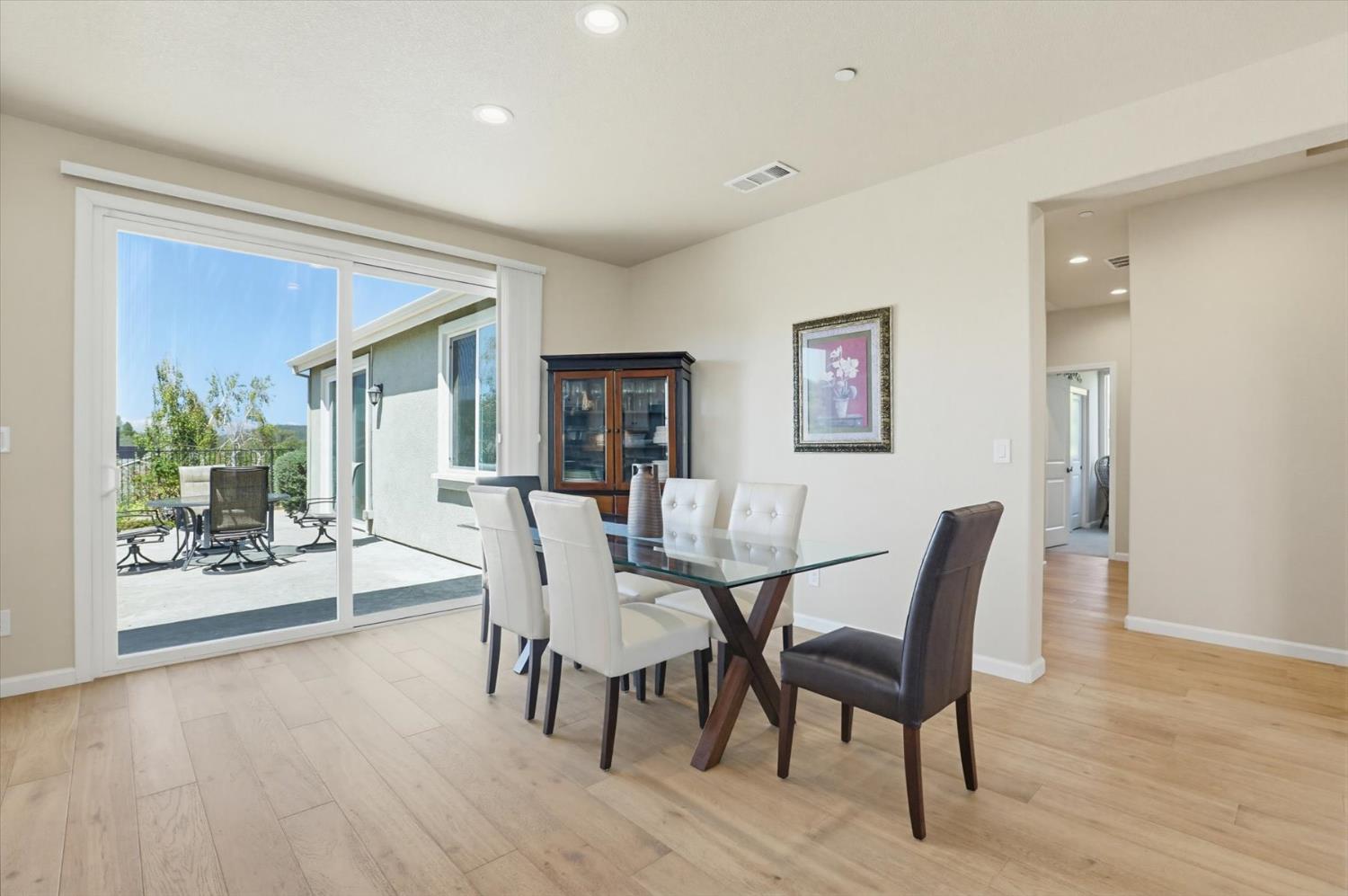 21456 Rucker Court Grass Valley, CA 95949 - Photo 12 of 74 a dining room with furniture and wooden floor