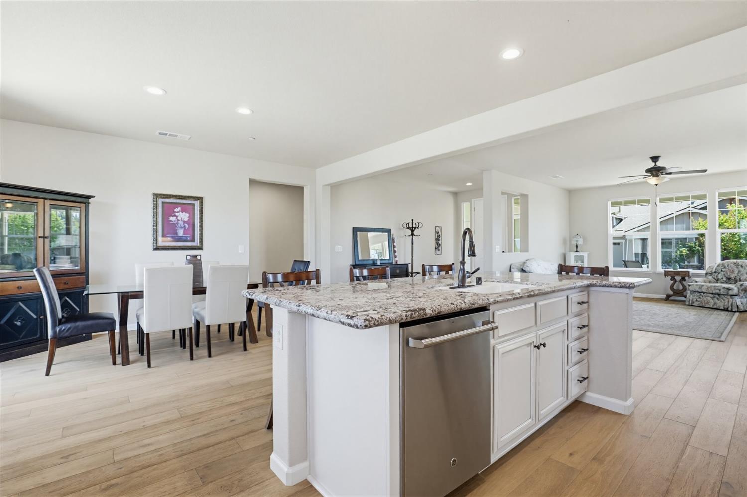 21456 Rucker Court Grass Valley, CA 95949 - Photo 19 of 74 a kitchen with lots of counter top space and painting on the wall