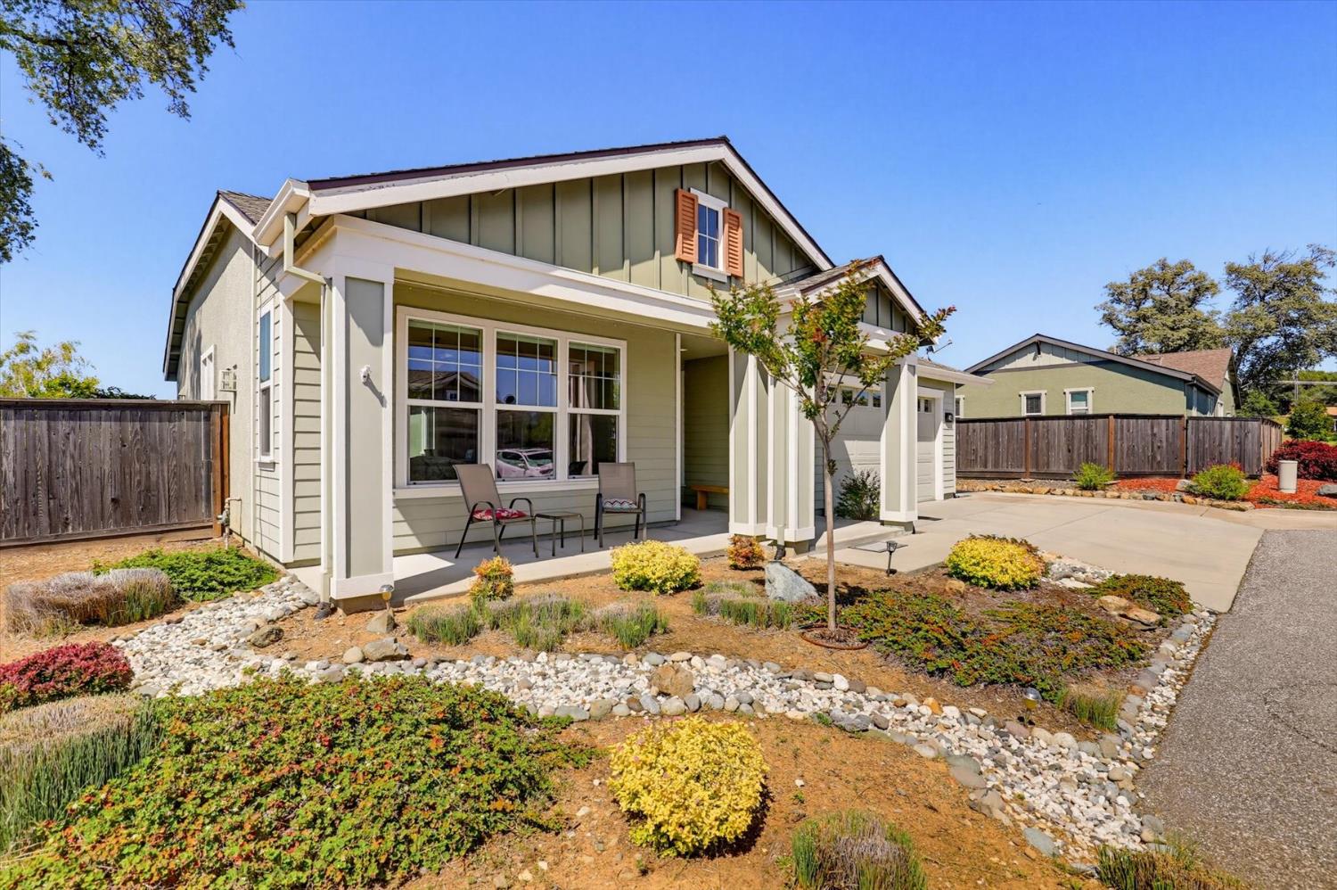 21456 Rucker Court Grass Valley, CA 95949 - Photo 2 of 74 a front view of a house with garden