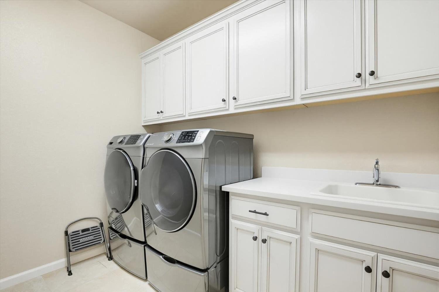 21456 Rucker Court Grass Valley, CA 95949 - Photo 23 of 74 a utility room with sink dryer and washer