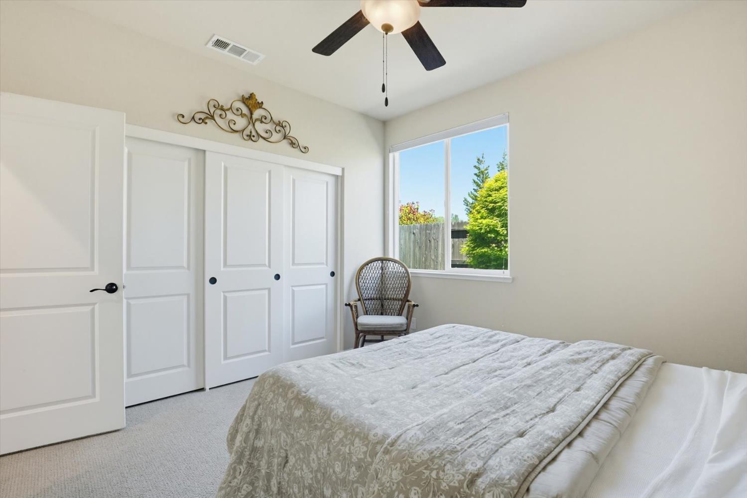 21456 Rucker Court Grass Valley, CA 95949 - Photo 27 of 74 a bedroom with a bed and a window