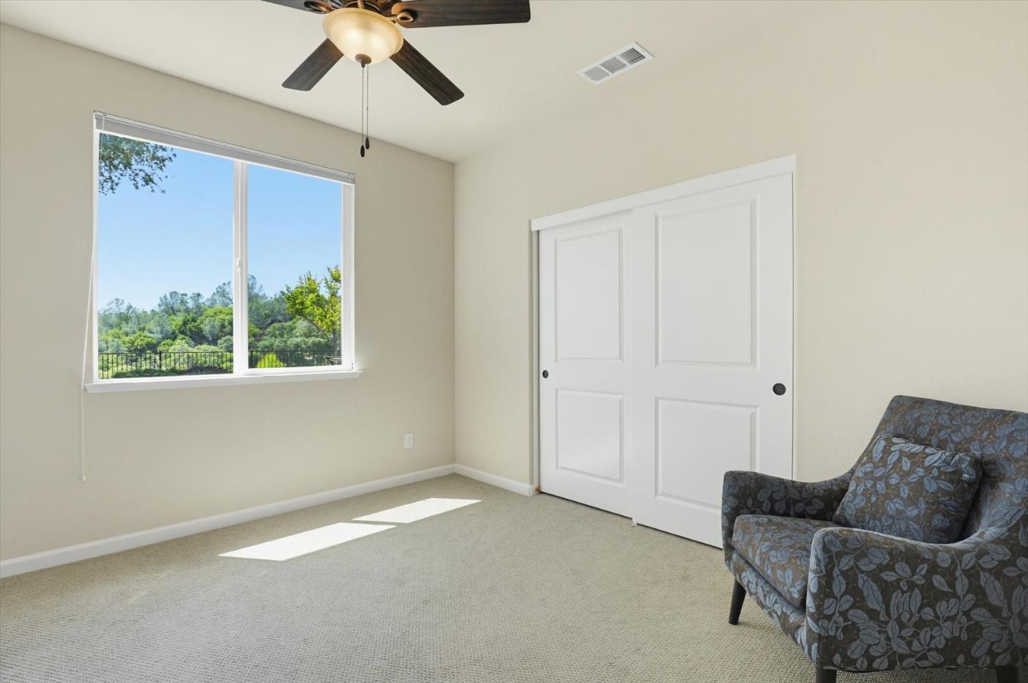 21456 Rucker Court Grass Valley, CA 95949 - Photo 29 of 74 a living room with furniture and a large window