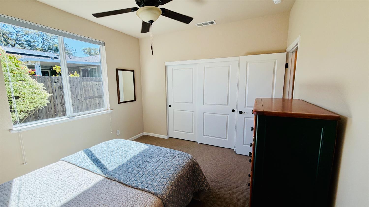21456 Rucker Court Grass Valley, CA 95949 - Photo 34 of 74 a bedroom with a bed and a window