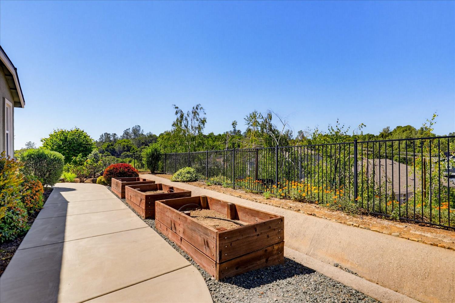 21456 Rucker Court Grass Valley, CA 95949 - Photo 58 of 74 a view of a terrace with couches and wooden fence