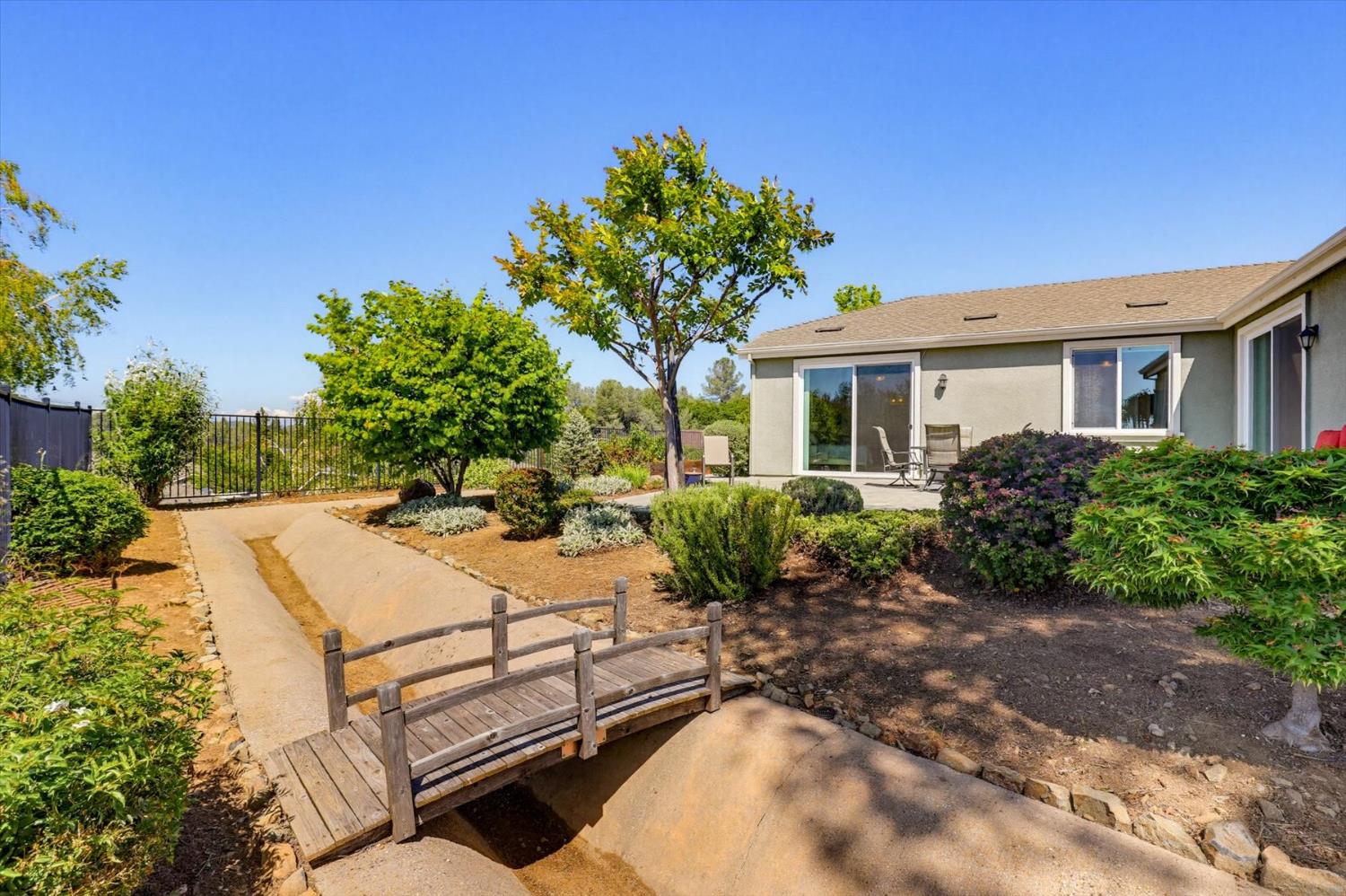 21456 Rucker Court Grass Valley, CA 95949 - Photo 62 of 74 a view of a house with backyard and sitting area