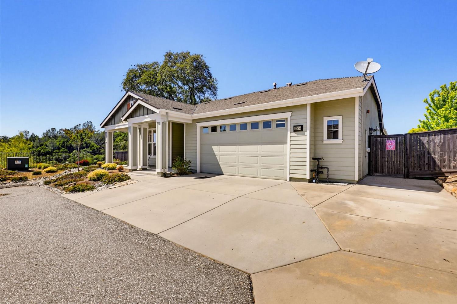 21456 Rucker Court Grass Valley, CA 95949 - Photo 67 of 74 a view of a house with a yard and garage