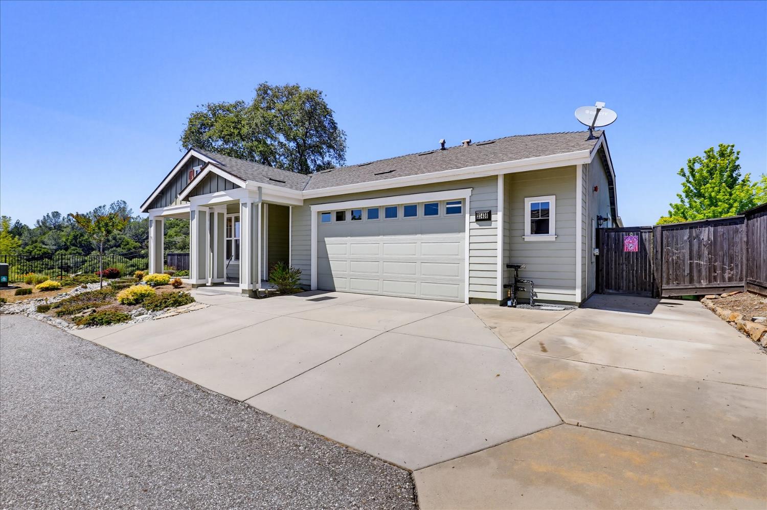 21456 Rucker Court Grass Valley, CA 95949 - Photo 69 of 74 a view of a house with a yard and potted plants