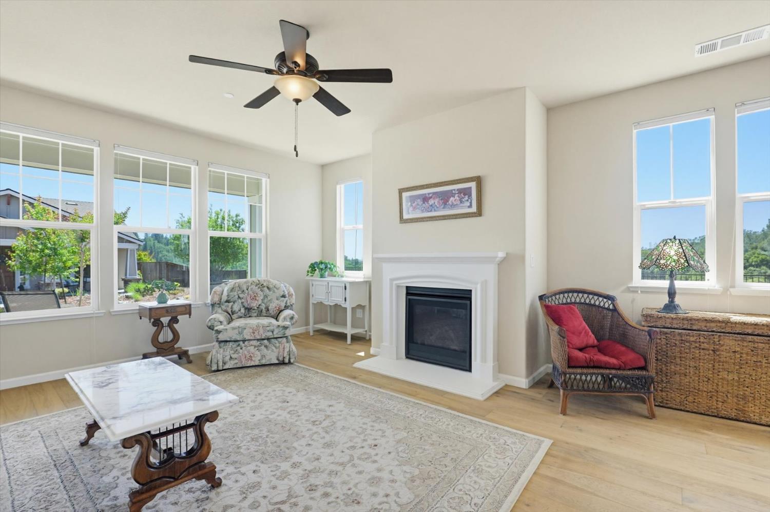 21456 Rucker Court Grass Valley, CA 95949 - Photo 7 of 74 a living room with furniture and a fireplace