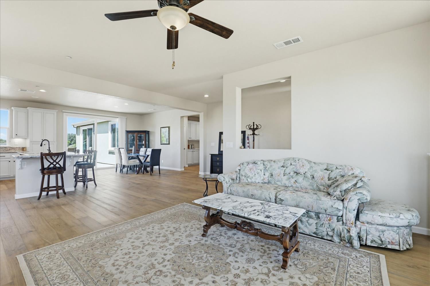 21456 Rucker Court Grass Valley, CA 95949 - Photo 10 of 74 a living room with furniture and wooden floor