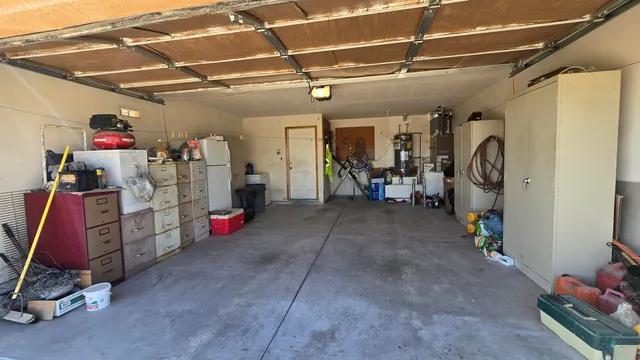 a view of a pathway of a house with a yard