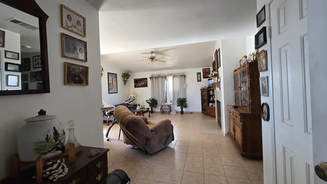 a living room with furniture and a window