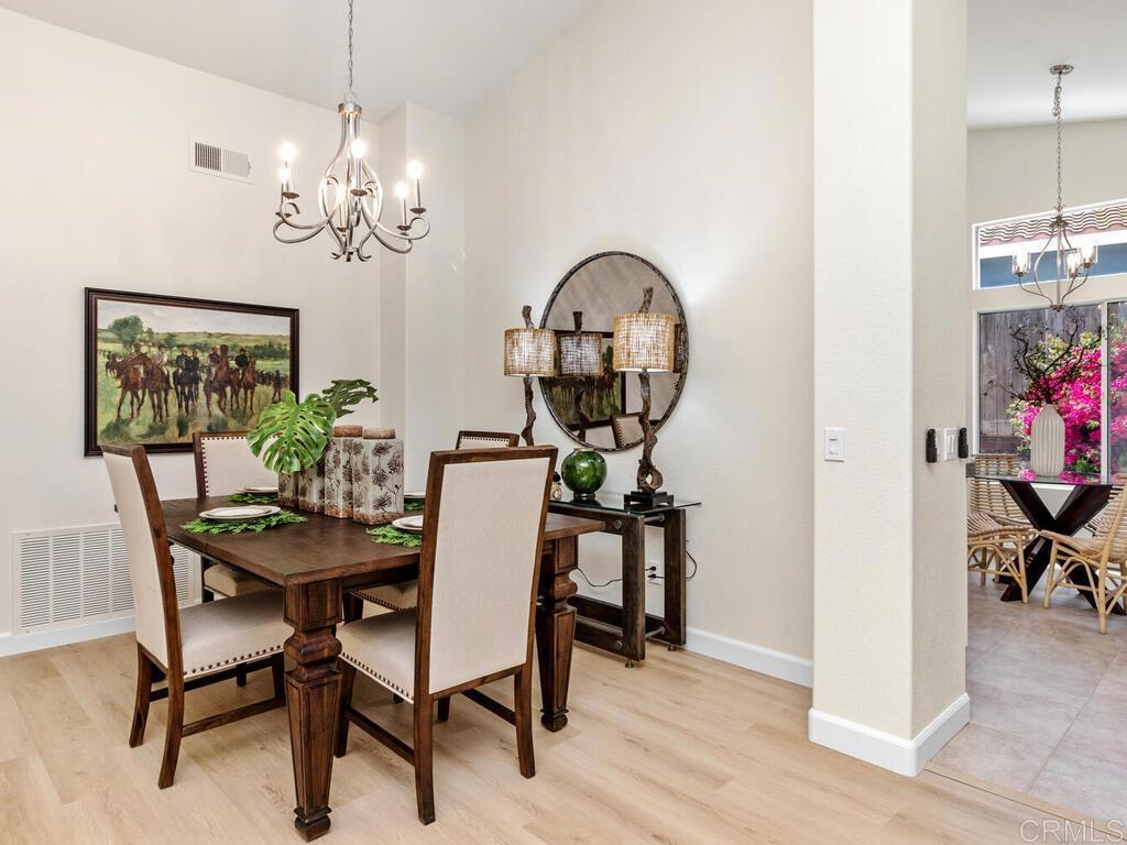 1219 Sunglow Drive Oceanside, CA 92056 - Photo 12 of 40 The Dining Room is perfect for a more formal dining experience with your new chandelier.