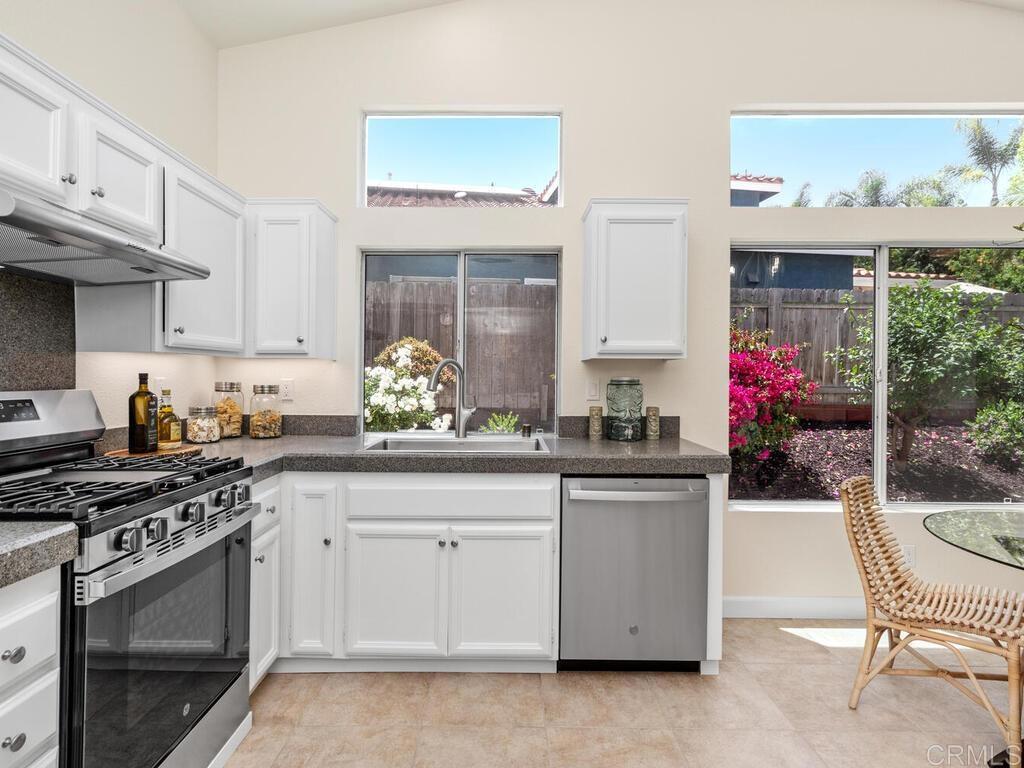 1219 Sunglow Drive Oceanside, CA 92056 - Photo 19 of 40 There is also a designer faucet & lots of granite counters for the chef in the family.