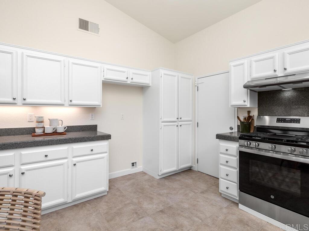 1219 Sunglow Drive Oceanside, CA 92056 - Photo 20 of 40 Brand New stainless appliances which include a dishwasher, stove & oversized single bowl sink.