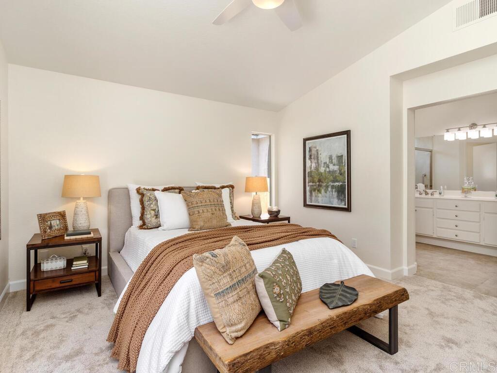 1219 Sunglow Drive Oceanside, CA 92056 - Photo 23 of 40 There is a nice size closet as well as an ensuite with a separate toilet room.