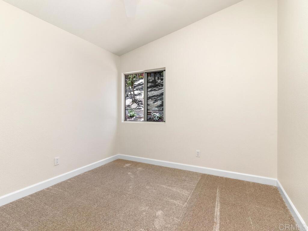 1219 Sunglow Drive Oceanside, CA 92056 - Photo 25 of 40 There is a Bedroom next to the Primary that has views of the Backyard.