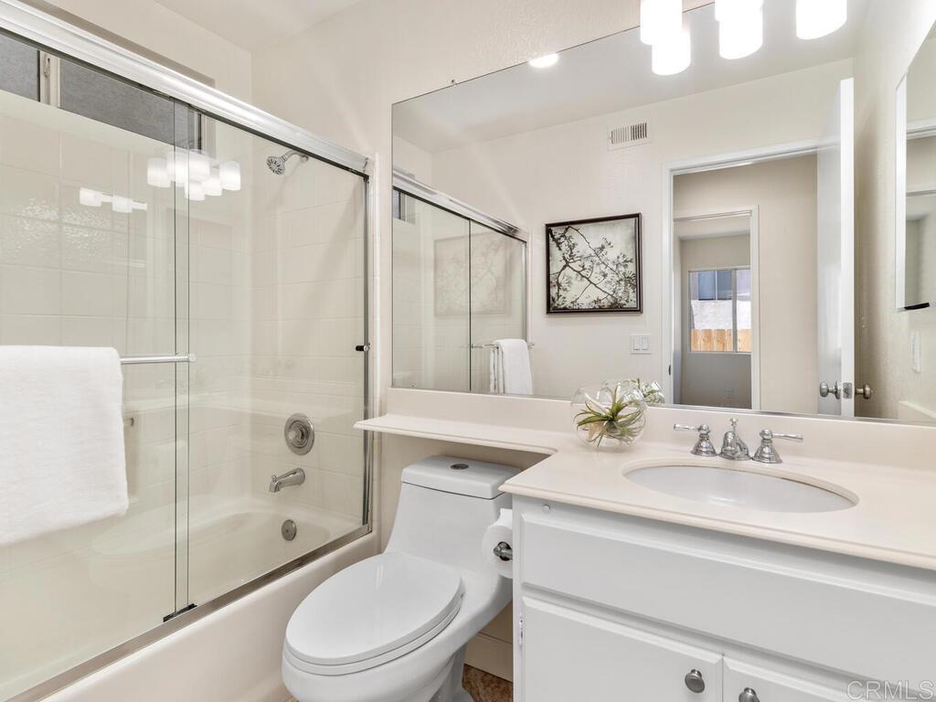 1219 Sunglow Drive Oceanside, CA 92056 - Photo 28 of 40 The 3 Bedrooms share the Bathroom located in the hallway which is where the tub/shower combo is