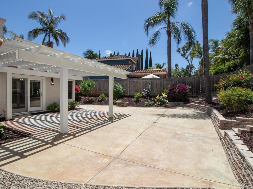 1219 Sunglow Drive Oceanside, CA 92056 - Photo 32 of 40 The Backyard is low maintenance yet designed with the perfect amount of tropical foliage