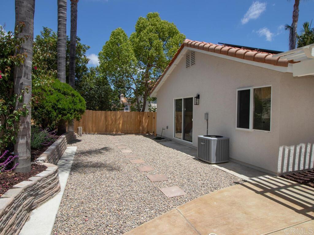 1219 Sunglow Drive Oceanside, CA 92056 - Photo 33 of 40 The Primary Bedroom has it's own private access to the Backyard. Future Patio??