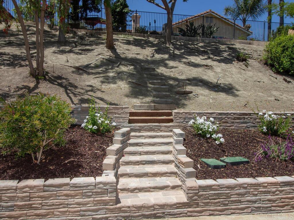 1219 Sunglow Drive Oceanside, CA 92056 - Photo 36 of 40 The hillside allows for the new owner to add their own personal touch