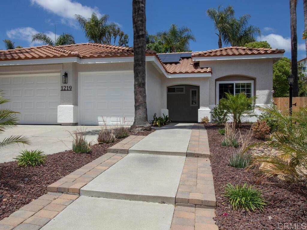 1219 Sunglow Drive Oceanside, CA 92056 - Photo 4 of 40 You can immediately see the thoughtfulness that went into the creation of such a lavish front yard.